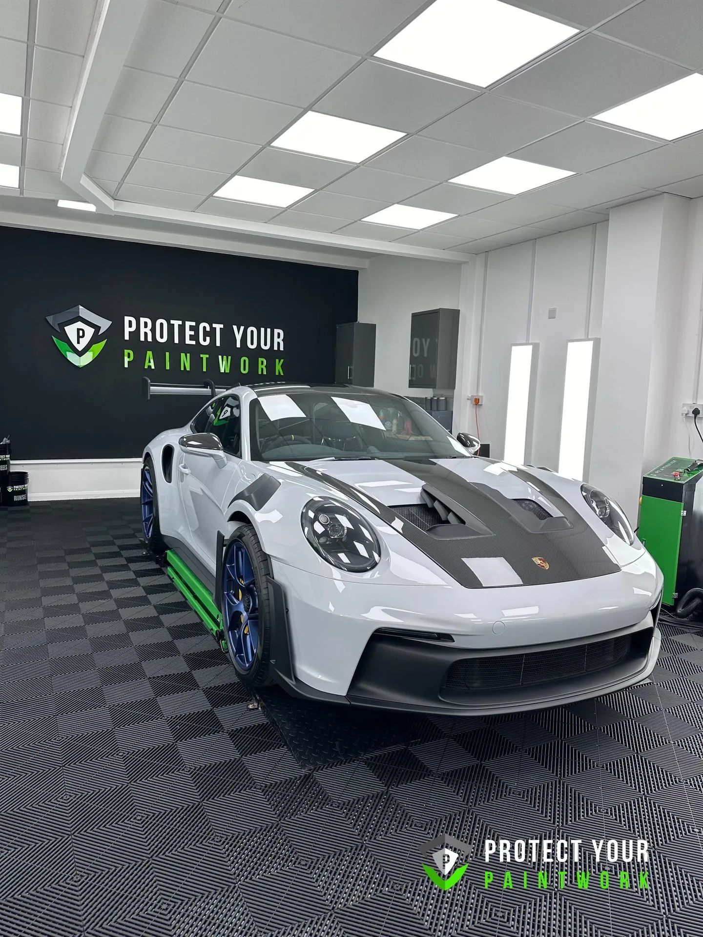 Paint protection film being applied in the studio